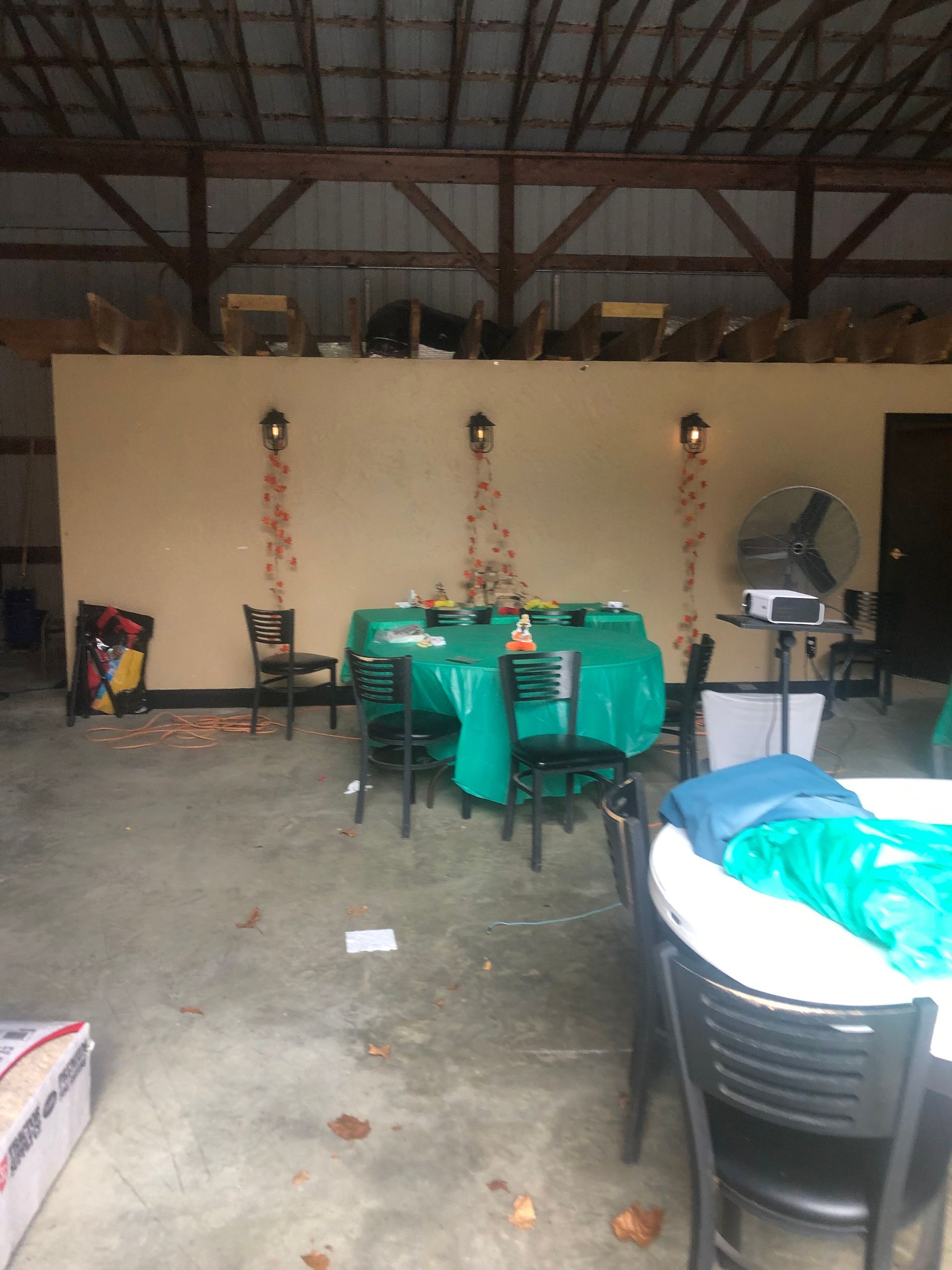 a room with a table and chairs in it