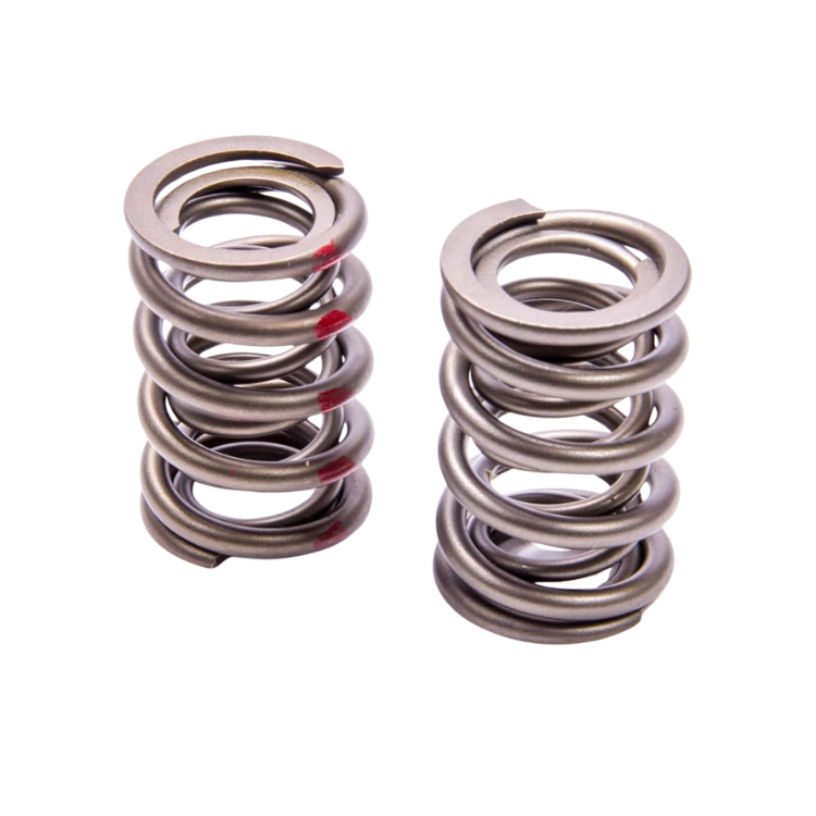 A pair of stainless steel springs on a white background