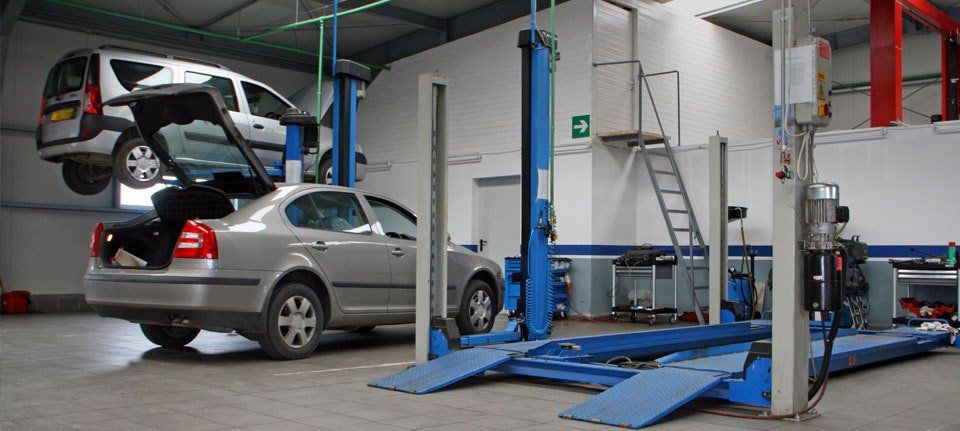 An MOT bay with cars being tested 