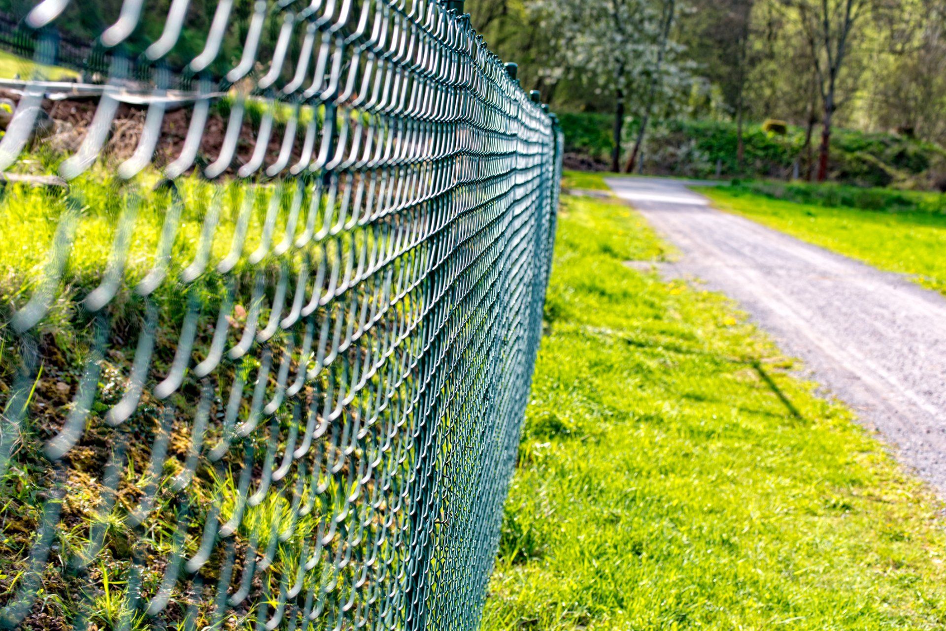 Chain Link Fence Repair — Metal Fence on the road  in Auburn, CA