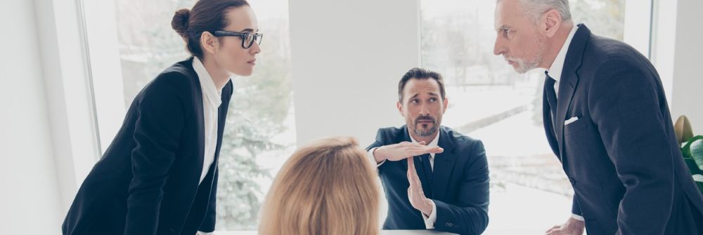 Manager mediating employee conflict