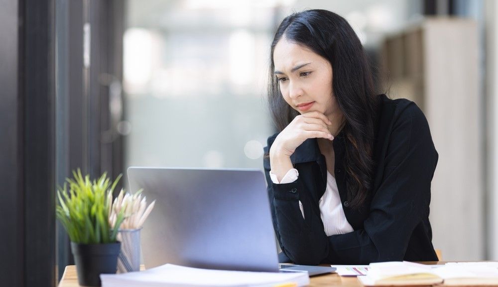 Female exec reviewing results of an HR Audit