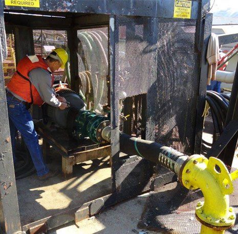 Man Checking the Water Pump Machine — Gretna, LA — Advanced Industrial Products