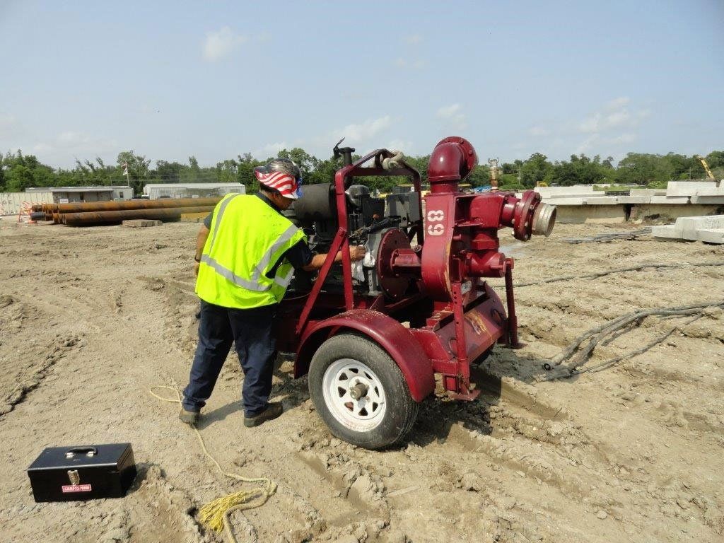Man Checking the Machine — Gretna, LA — Advanced Industrial Products