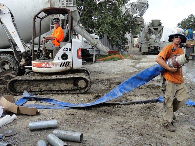 Men Working on the Road — Gretna, LA — Advanced Industrial Products
