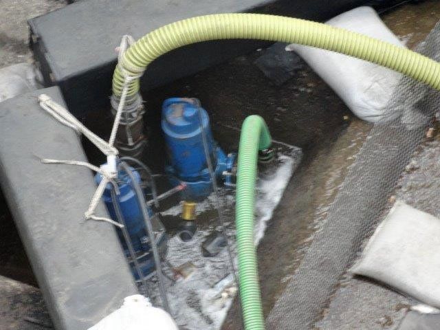 Two Hoses Connected to Blue Water Pump — Gretna, LA — Advanced Industrial Products