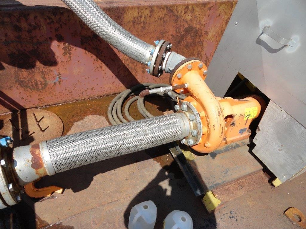 Hoses Connected to Yellow Water Pump — Gretna, LA — Advanced Industrial Products