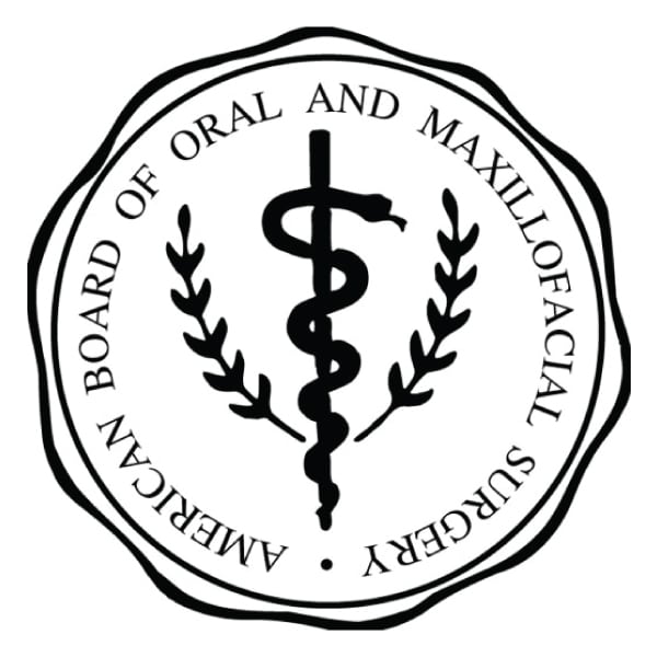 The logo for the board of oral and maxillofacial surgery