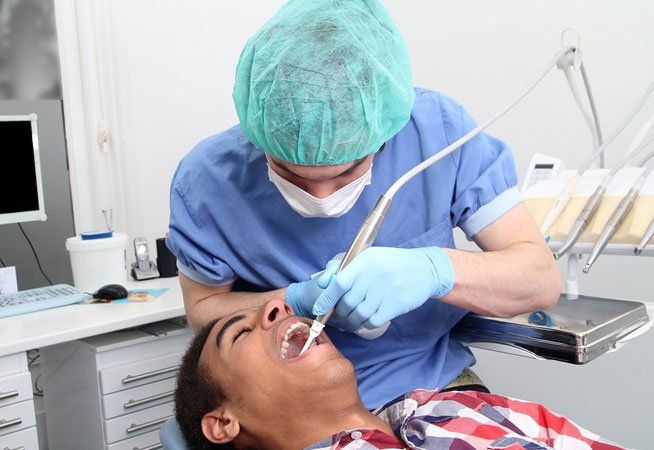 Dentist Performing Bone Grafting — San Diego, CA — San Diego Oral Maxillofacial