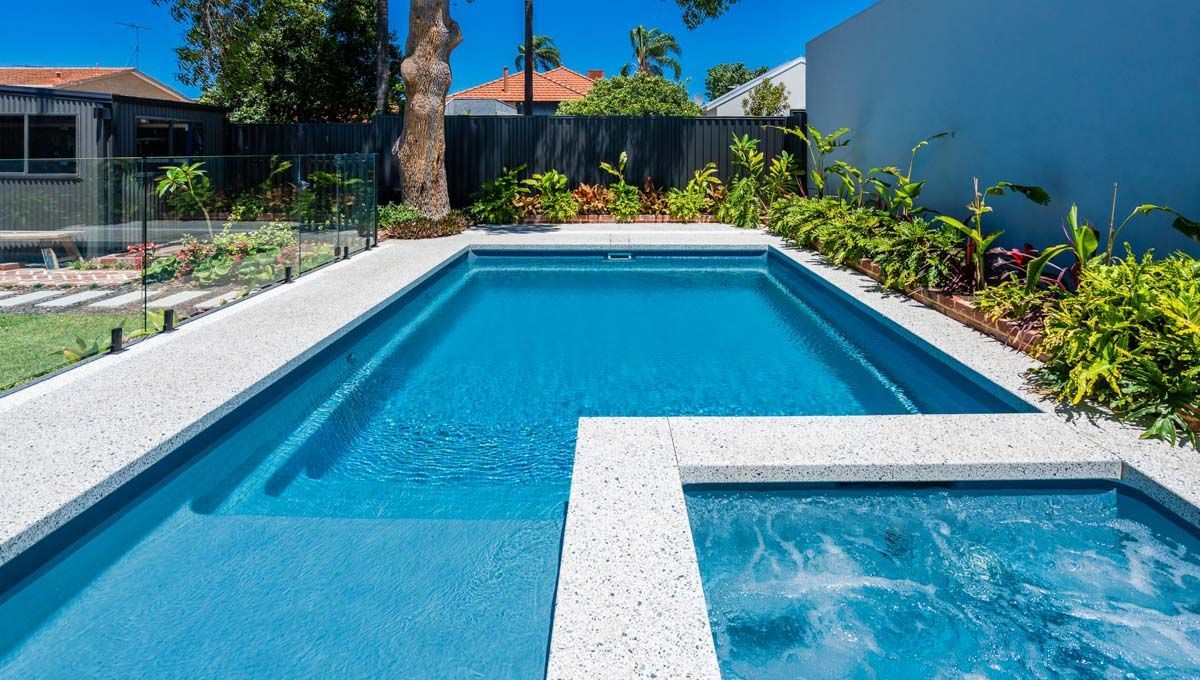 A Picture of a Medium Swimming Pool of a Brooklyn 8.6m x 4.4m Hampton Grey Shimmer Wembley — SJ Pools and Concreting in Dubbo, NSW