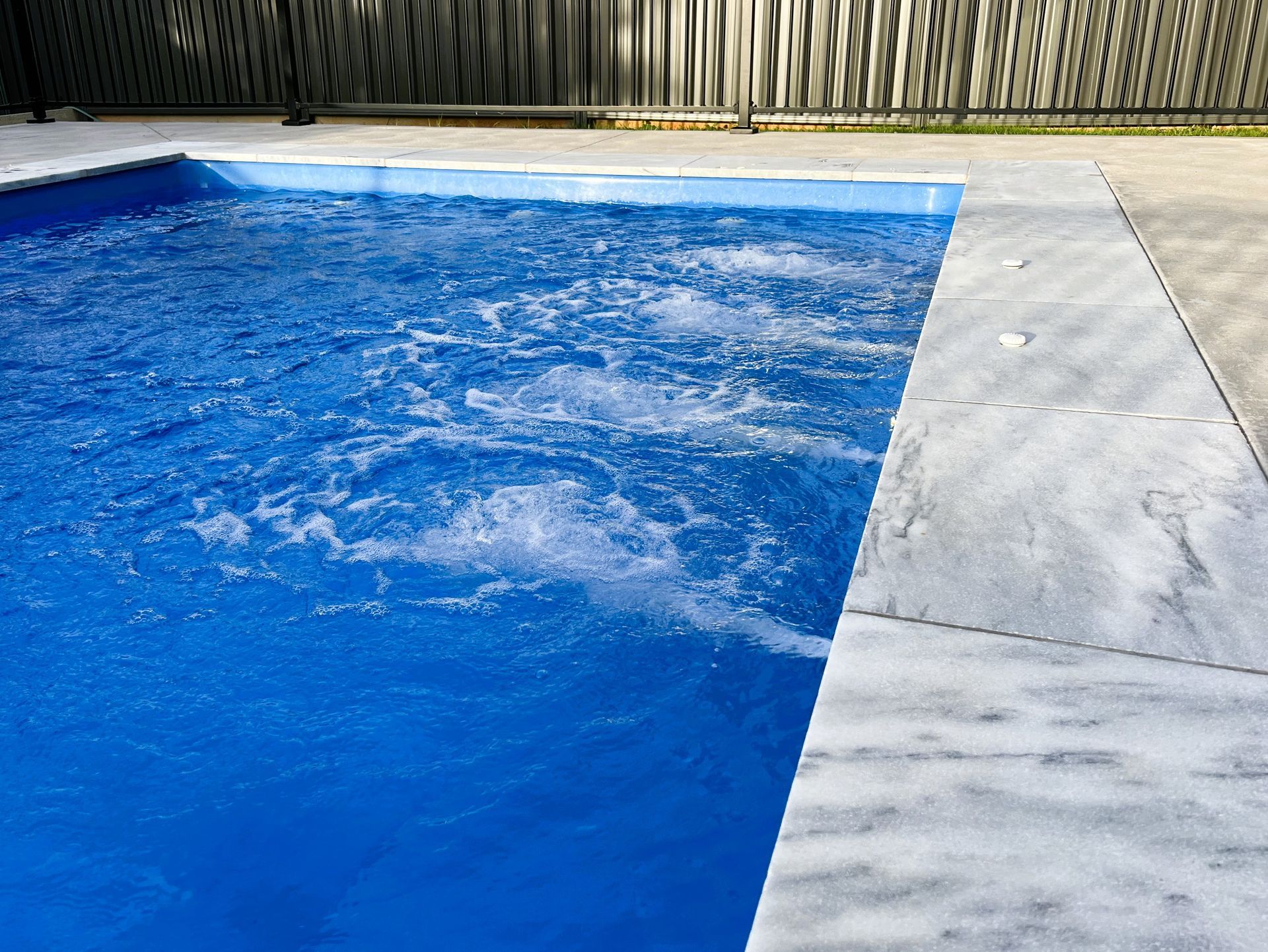An extreme close up of a swimming pool with jets — SJ Pools and Concreting In Dubbo, NSW