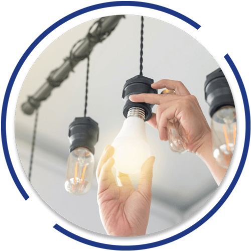 Installing Light Bulb — Iowa City, IA — Rush Electric LLC