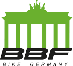 Il logo di Bike Germany è un edificio verde con una corona in cima.