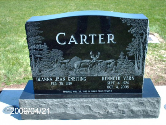 Black granite tombstone with 