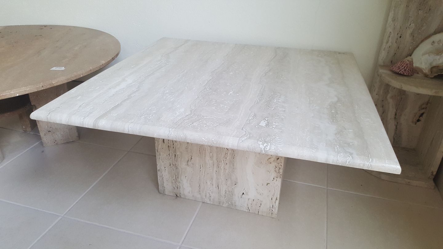 A Square Marble Coffee Table Is Sitting On A Tiled Floor In A Room — Gori Marble & Granite Pty Ltd in Earlville, QLD