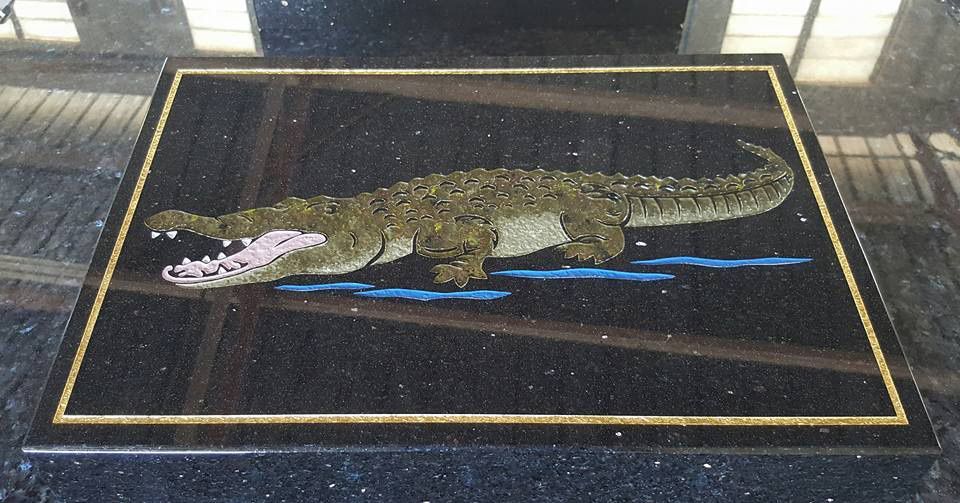 A Picture Of A Crocodile On A Black Surface — Gori Marble & Granite Pty Ltd in Earlville, QLD