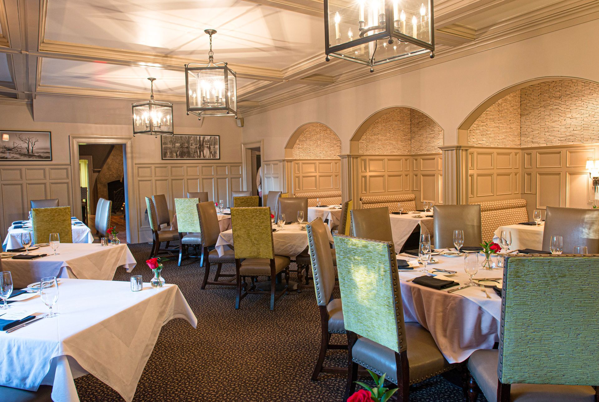 A large dining room filled with tables and chairs.