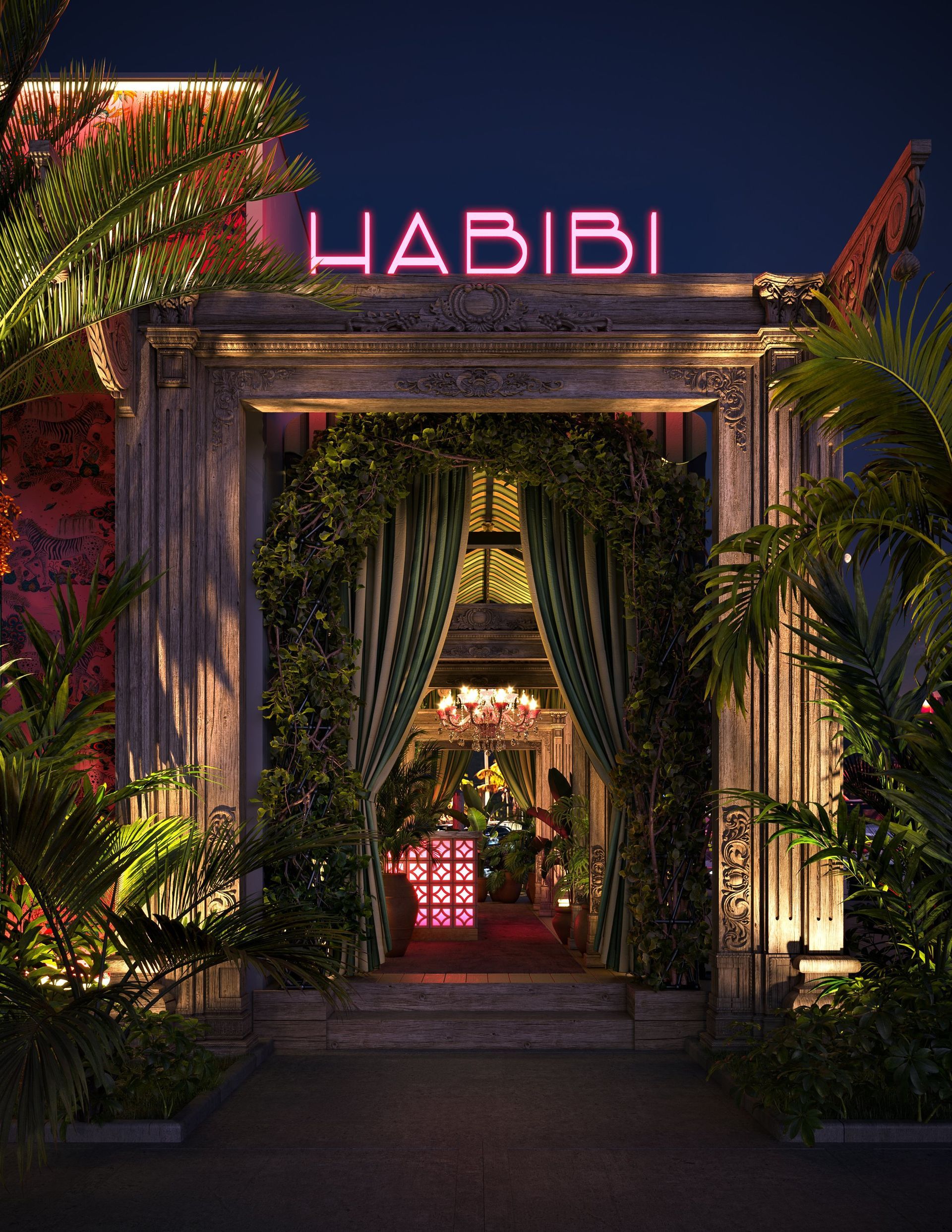 The entrance to the habibi restaurant is lit up at night.