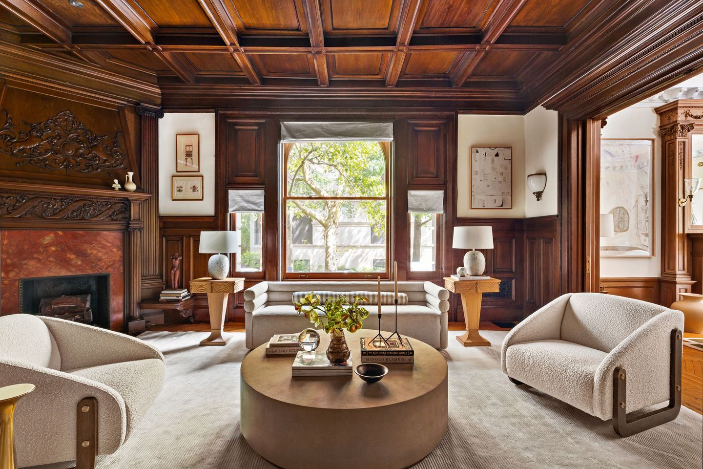 A living room filled with furniture and a fireplace.