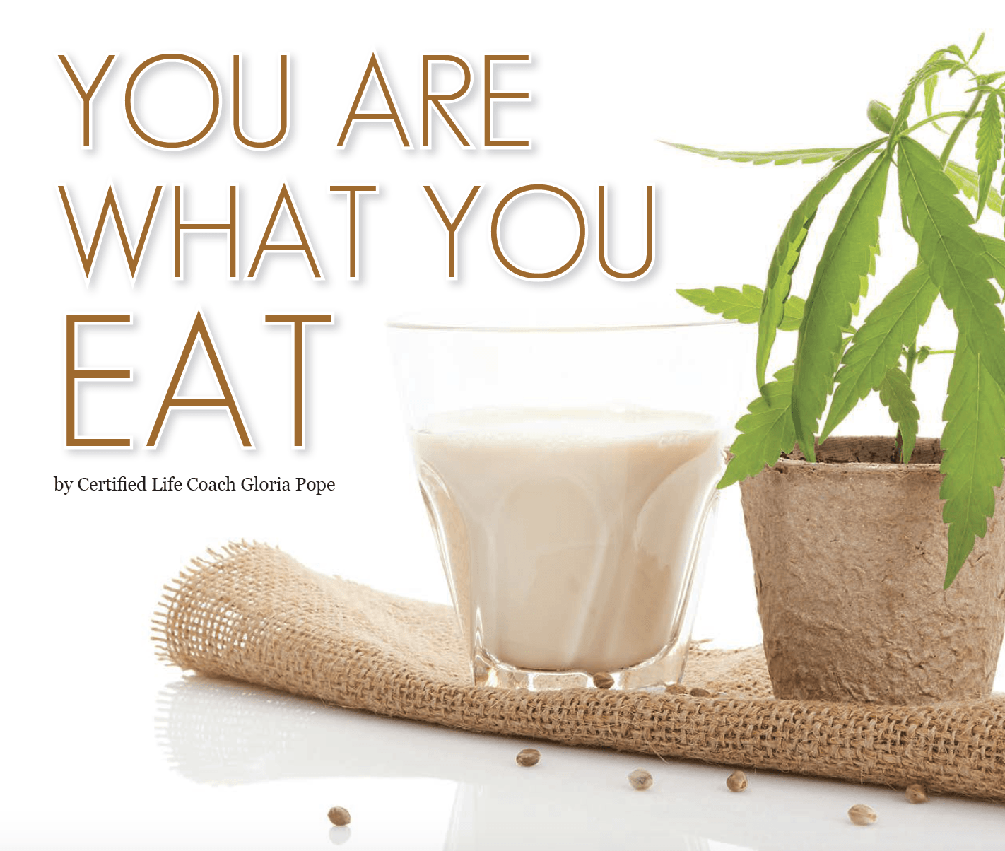 A picture of a plant and a glass of milk that says you are what you eat