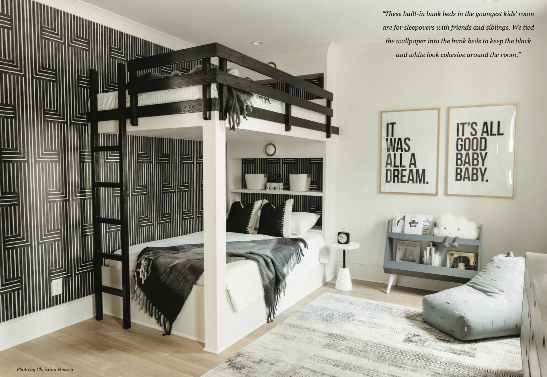 A black and white photo of a bedroom with a bunk bed.