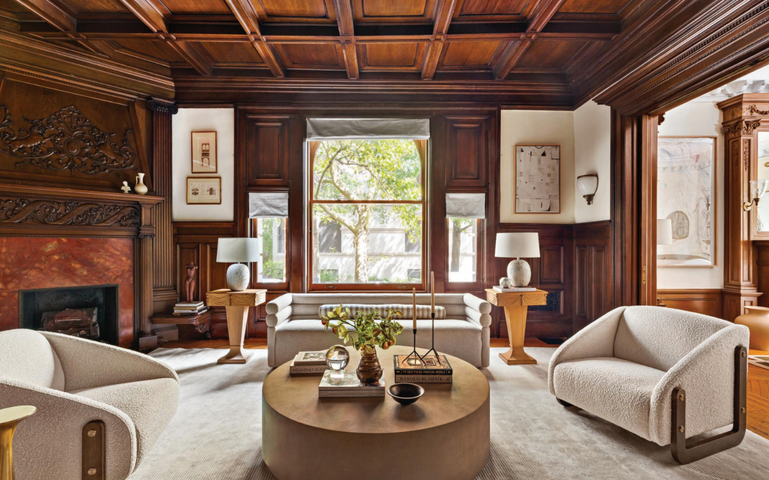 A living room filled with furniture and a fireplace.