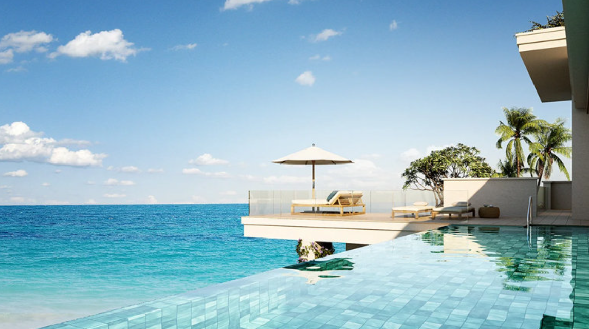 An artist 's impression of an infinity pool overlooking the ocean.