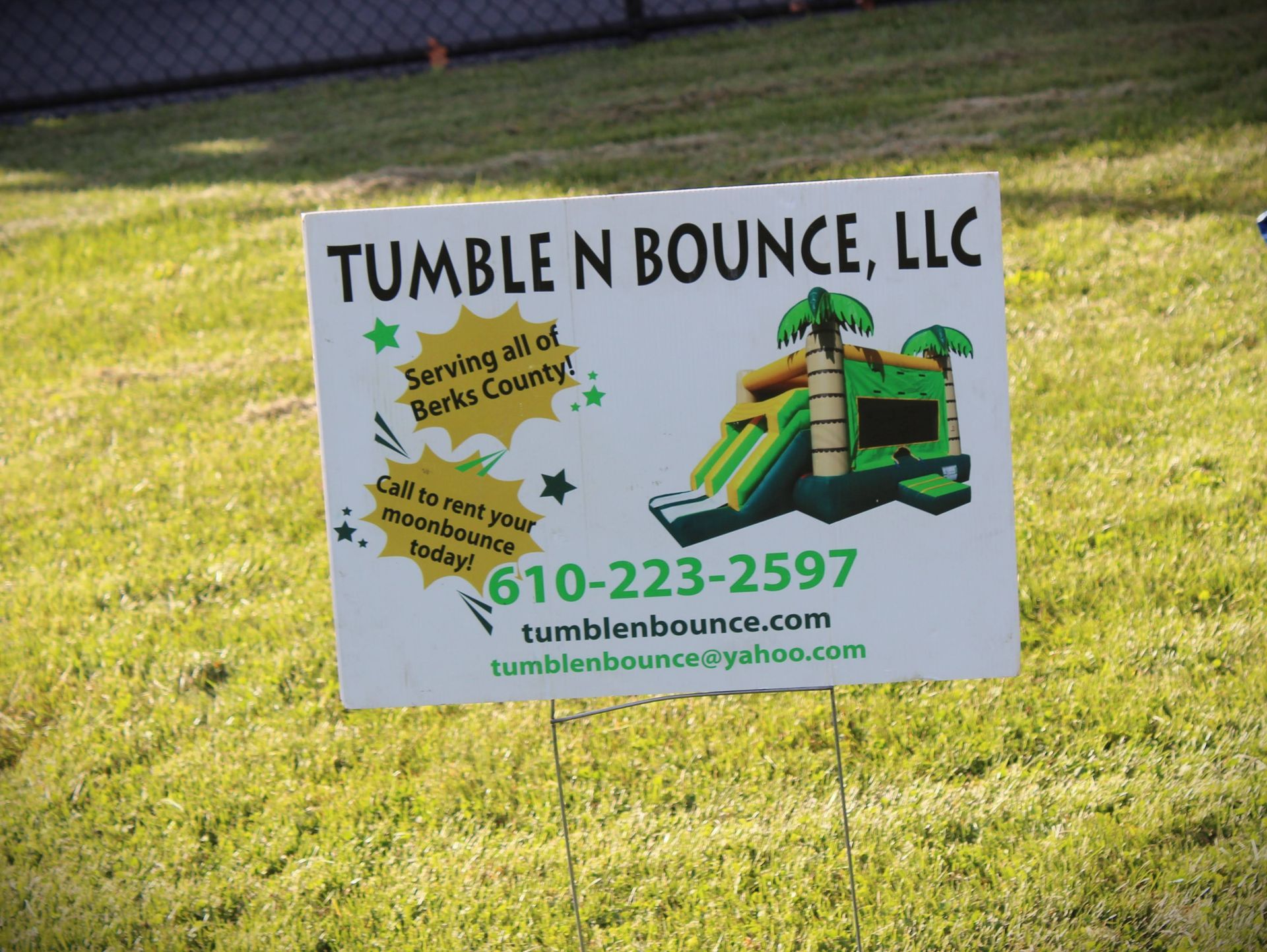 A sign that says tumble n bounce llc on it