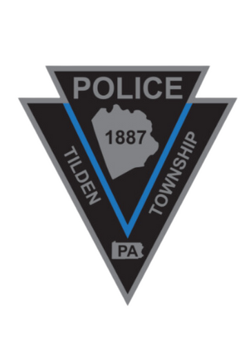 A black triangle with the word police on it