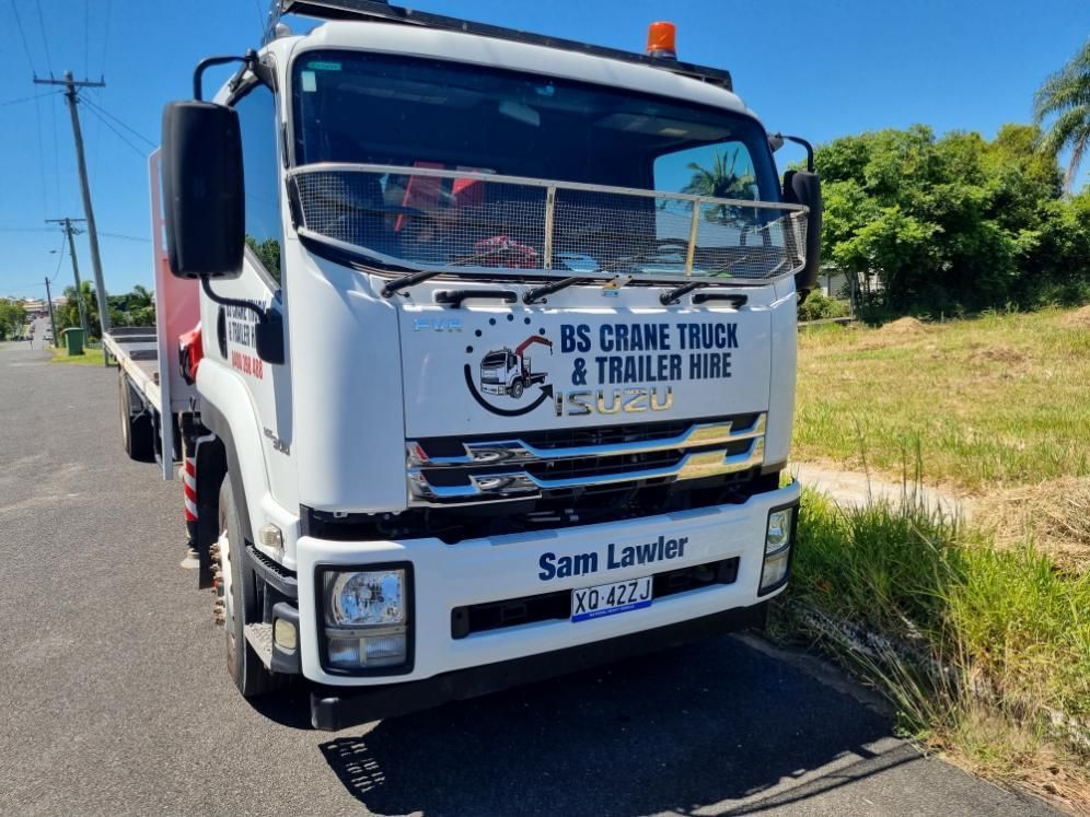 A White Tow Truck is Parked on the Side of the Road — BS Crane Truck and Trailer Hire In Eumundi, QLD