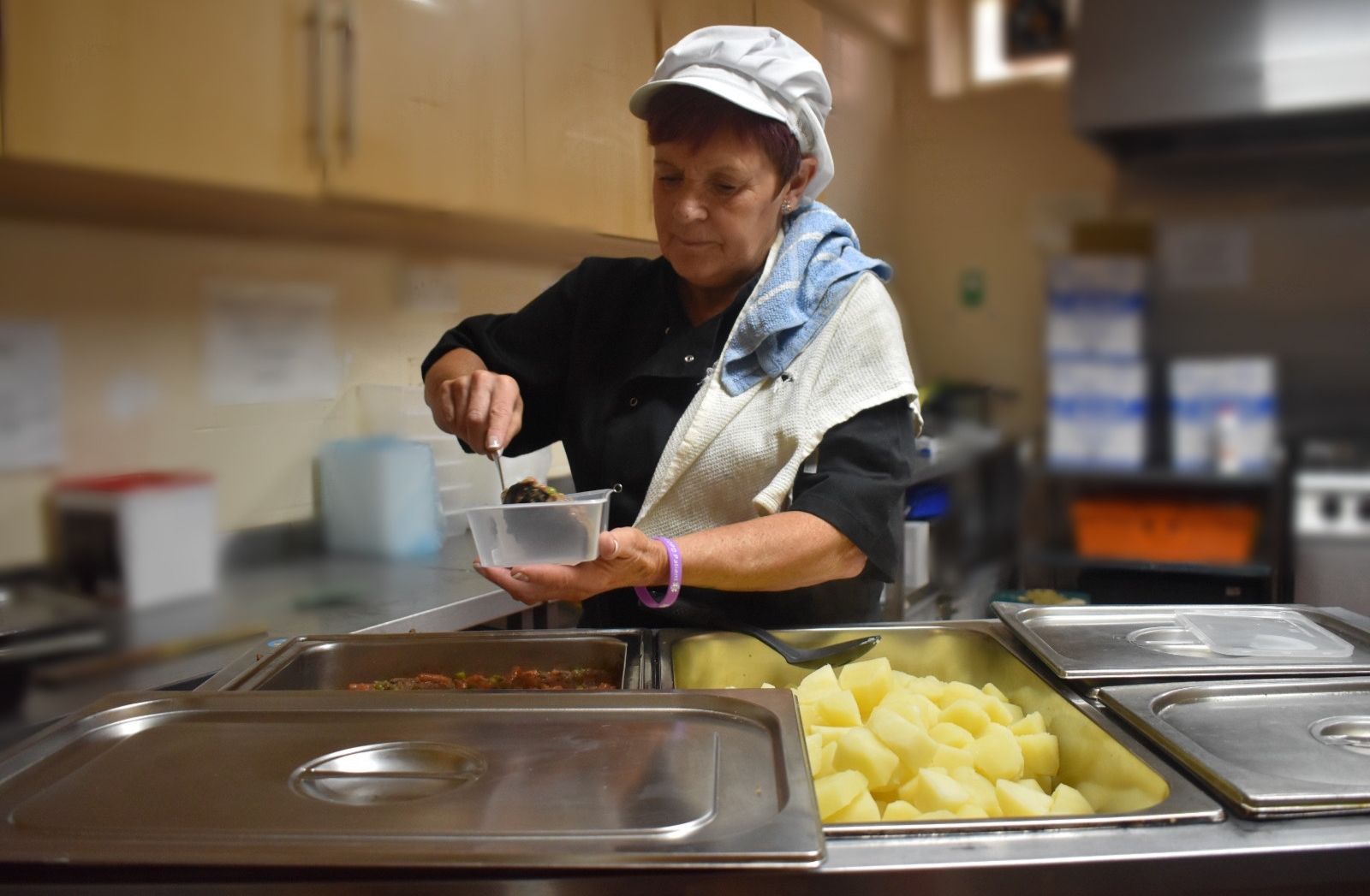 Cook preparing meals