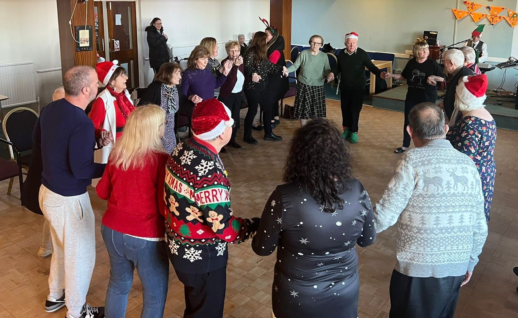 Volunteer and staff team merry Christmas