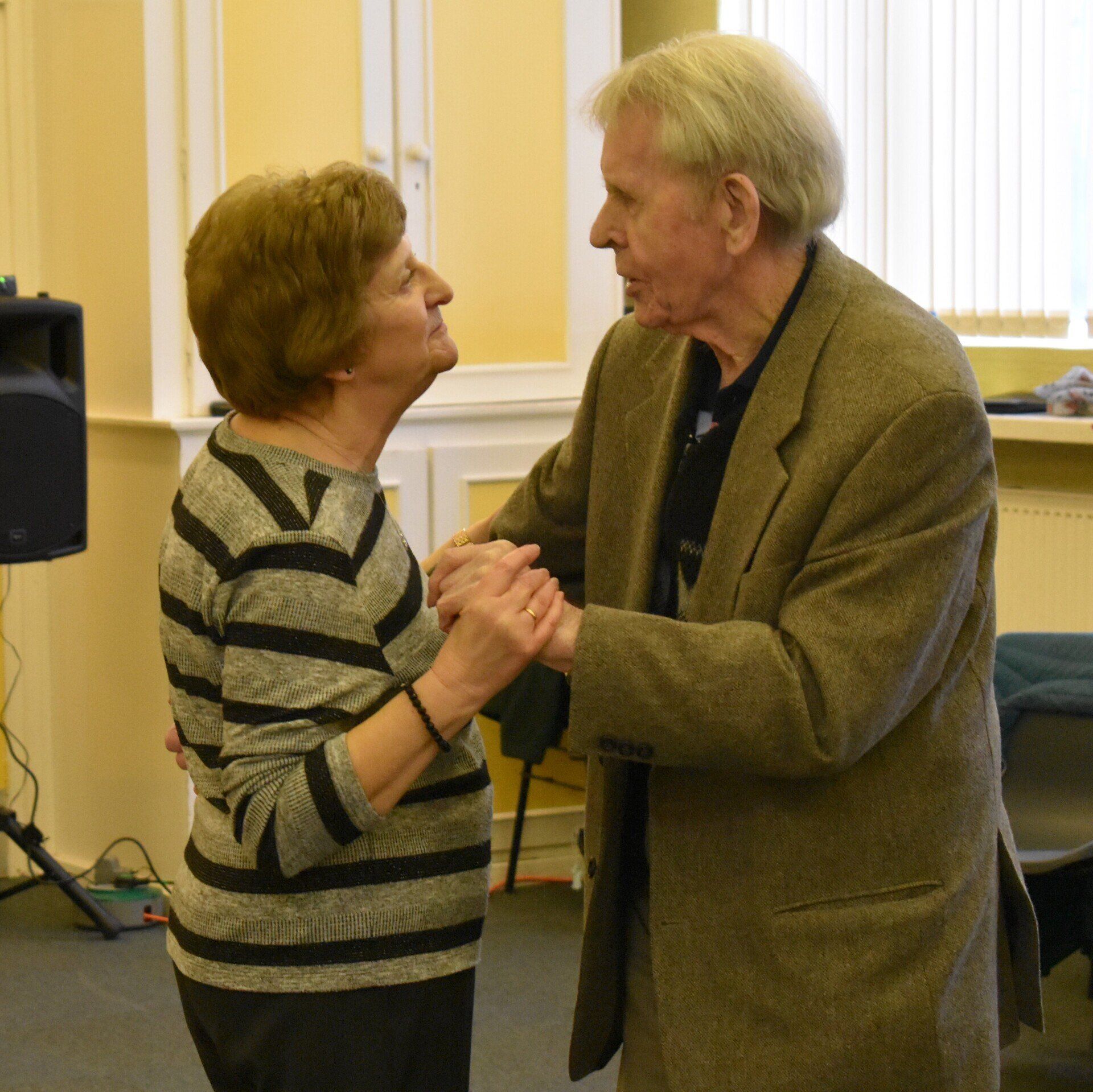 Elderly couple dancing