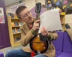 Jobe Sullivan teaching music