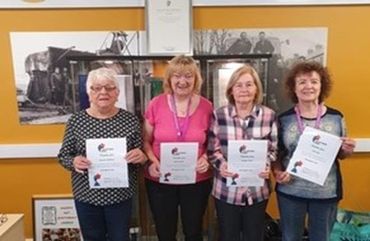 Volunteers with their certificates