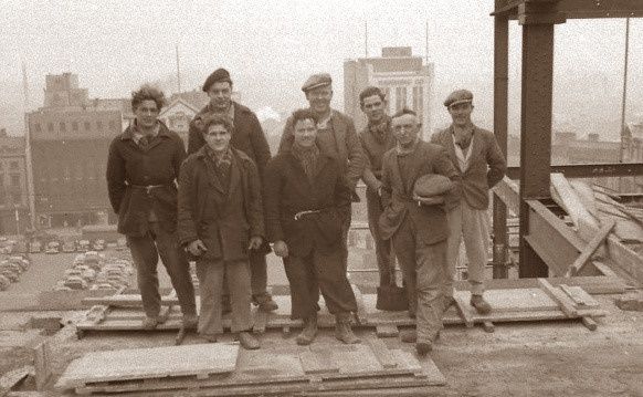 Old image of men on building site