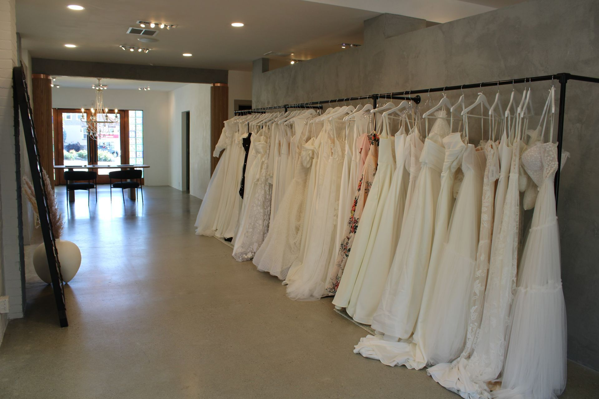 A selection of designer wedding gowns available for browsing at a Renee Atelier bridal appointment