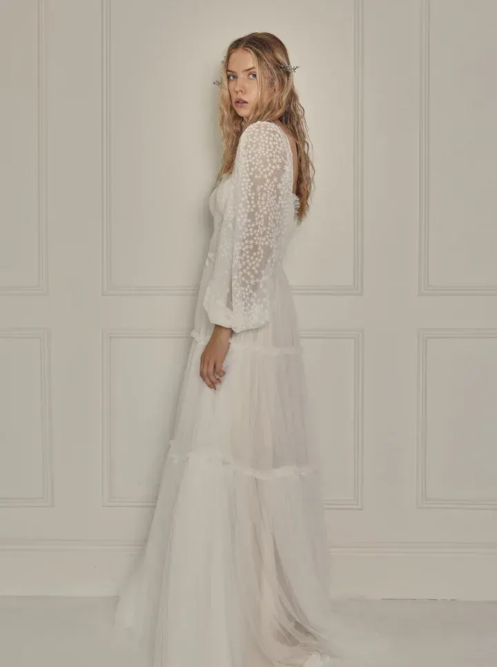 Flowy boho wedding dress with lace sleeves