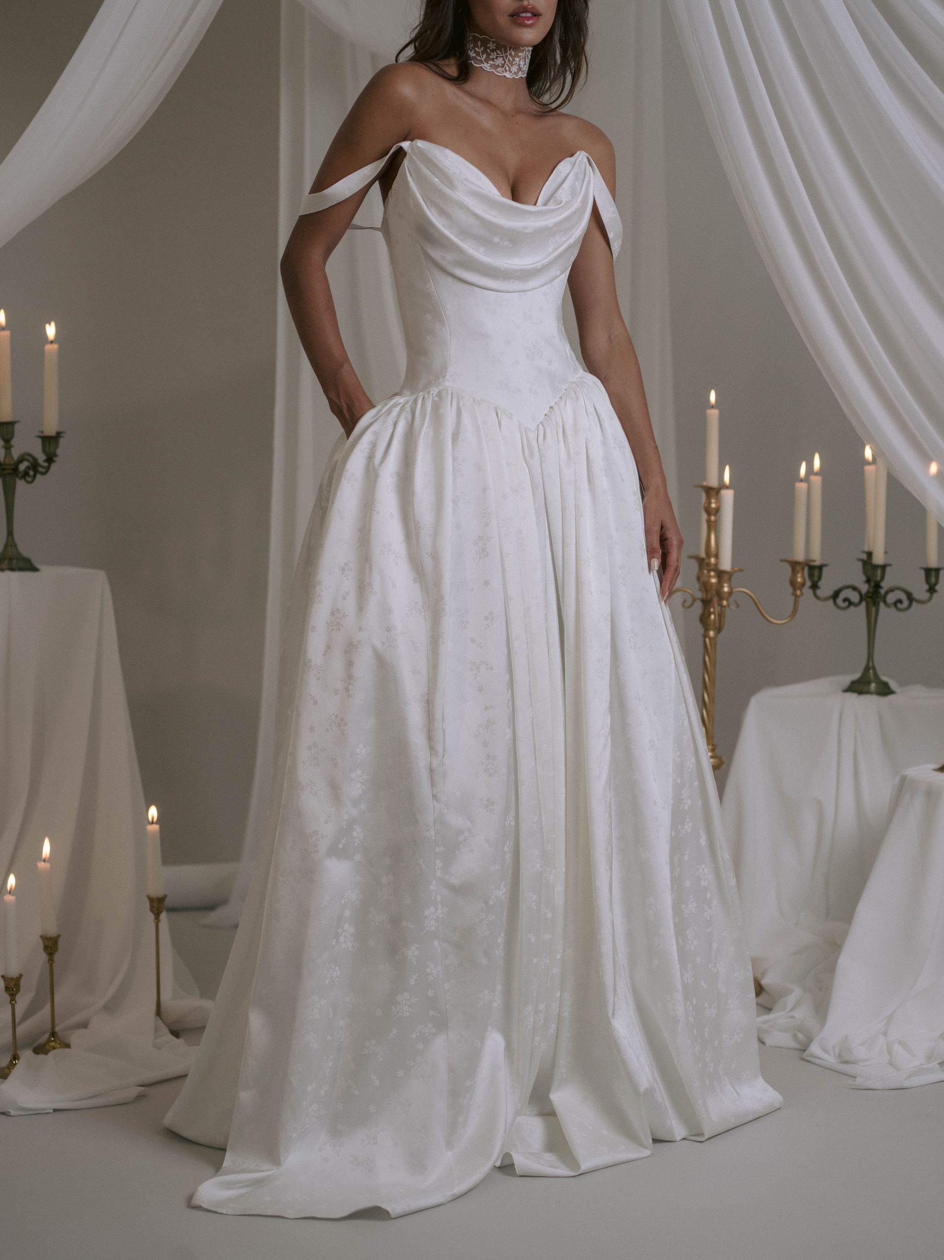 Bridal gown with fitted bodice and loose skirt