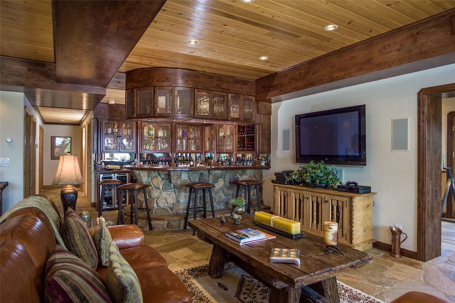 Rustic bar area downstairs, perfect for events and gatherings at The Ridge at Flathead Lake.