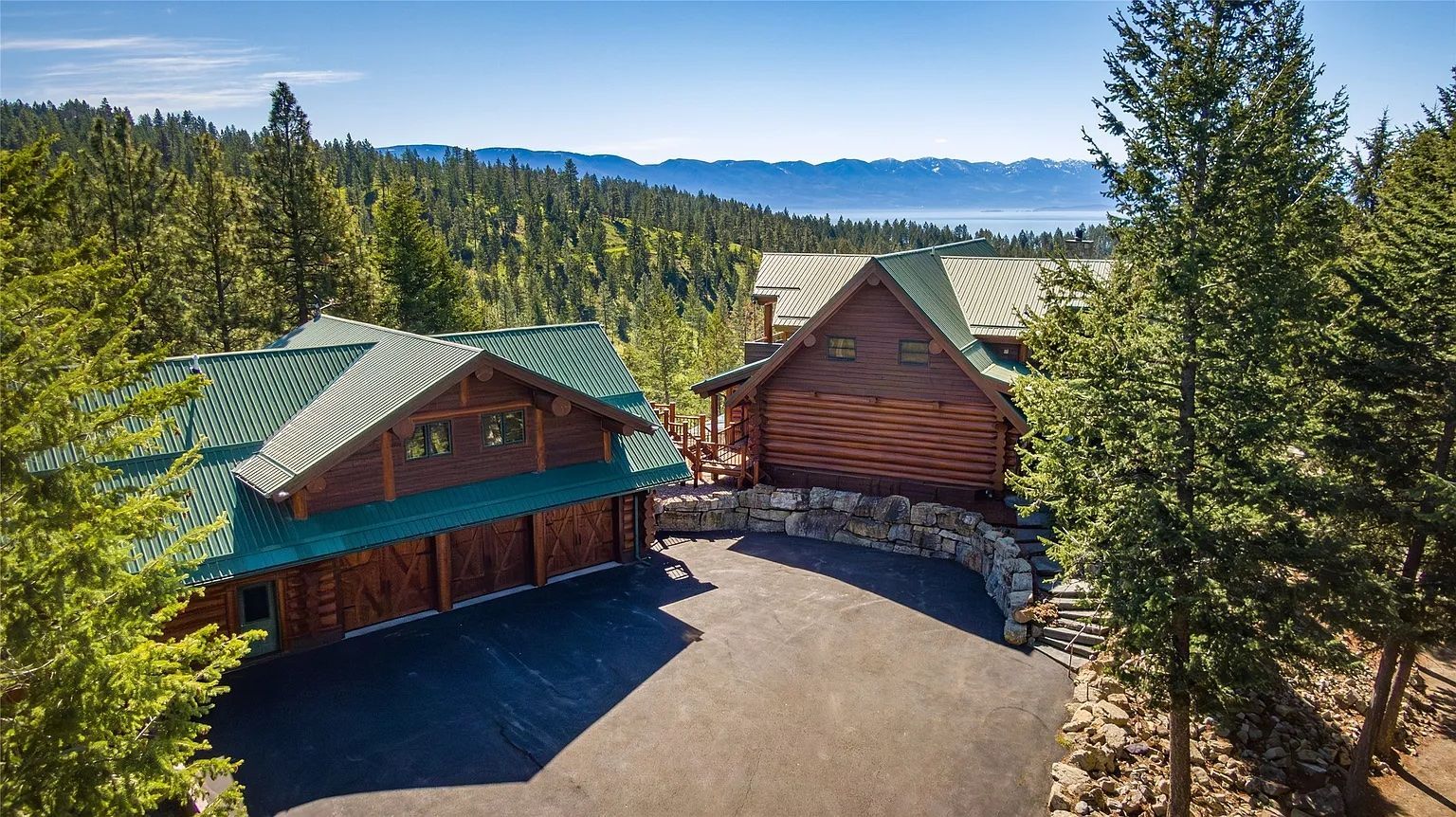Spacious parking area and garage at The Ridge lodge, convenient amenities for vacation rental guests near Flathead Lake.