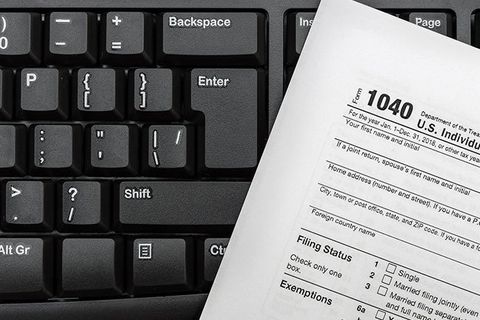 Tax Form Over the Keyboard — Pitman, NJ — Affordable Insurance Agency