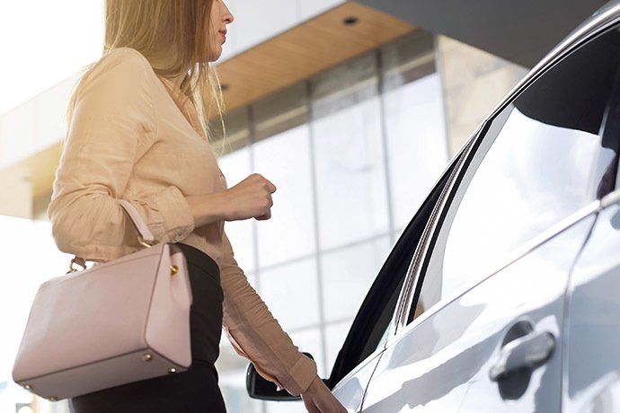 Auto Insurance — Woman Opening the Vehicle Door in Pitman, NJ