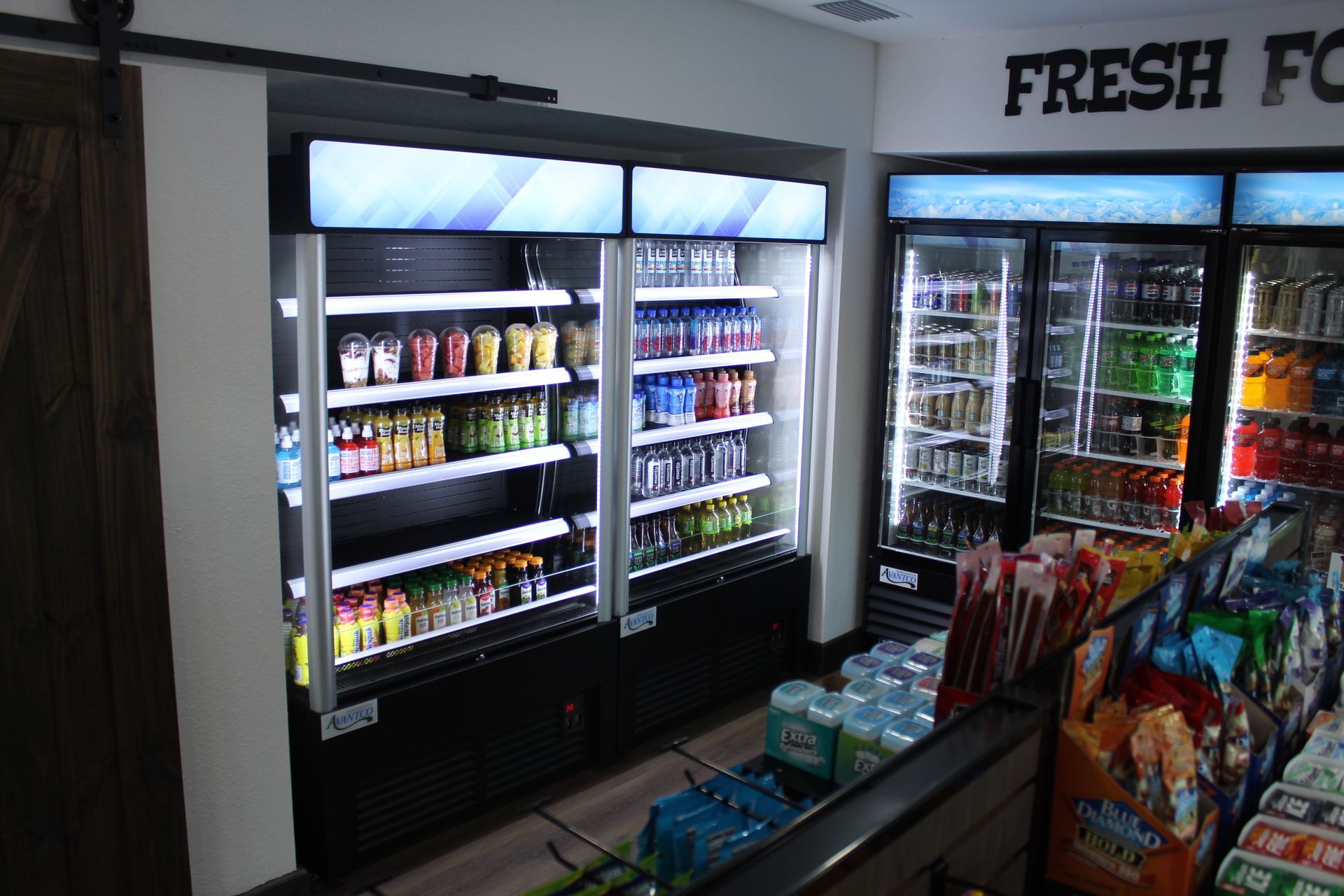 A grocery store with a sign that says fresh food