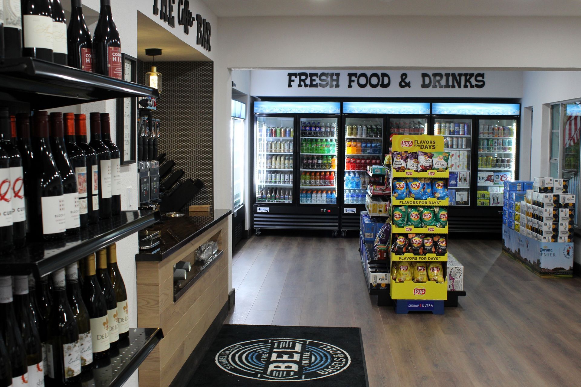 A store with a sign that says fresh food and drinks