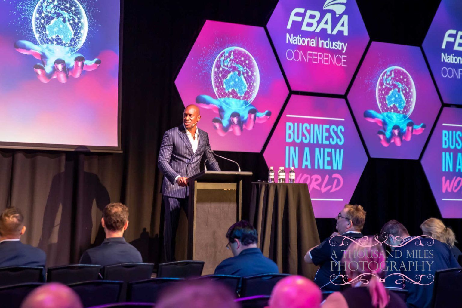 Man speaking at FBAA National Industry Conference; 