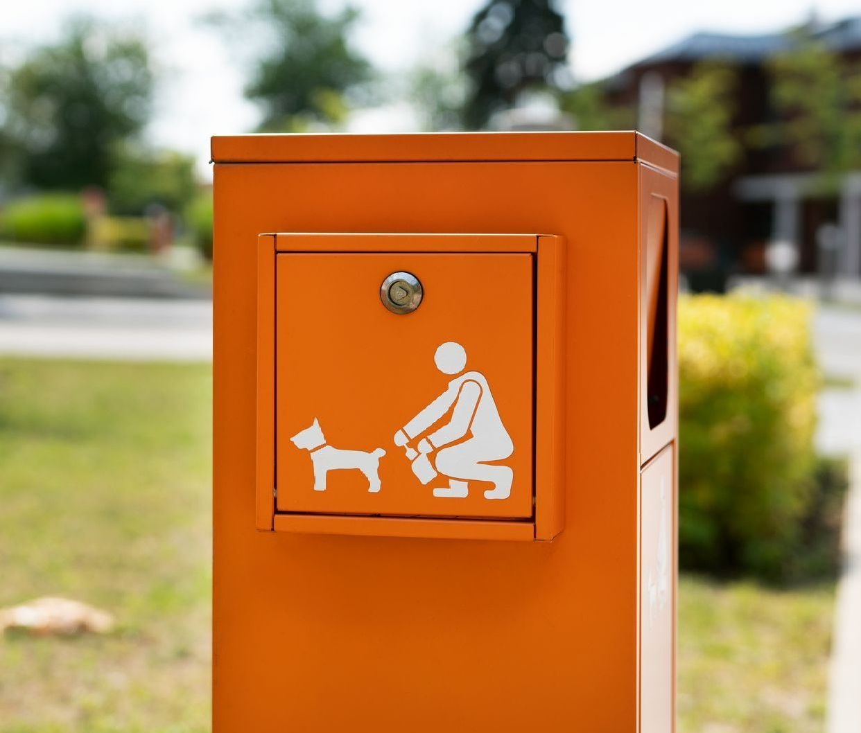 An orange box with a man and a dog on it