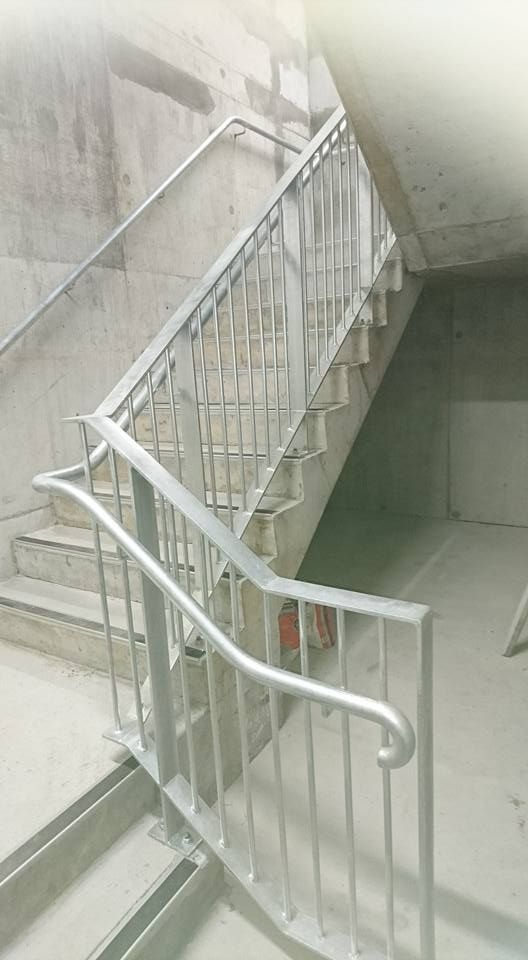 A Staircase With a Metal Railing in a Building Under Construction — Burke Metal Fabrication In Taree, NSW