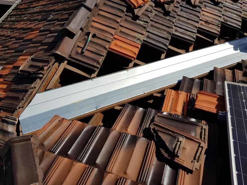 damaged roof with holes in it