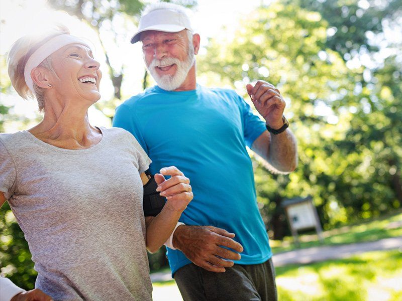 Senior Couple Jogging Together — Broadview Heights, OH — Broadview Chiropractic